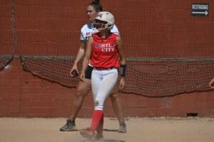 Maddie Robinson runs the bases, pumped up for her team during a game