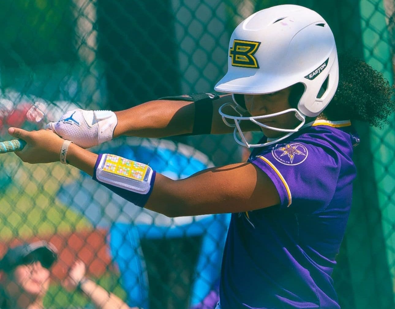 Class of 2027 Extra Elite 100 No. 1 infielder Aspen Boulware prepares for her next pitch at the plate. Her approach is rooted in consistency and confidence, honed through high-level reps and team-first mentality.