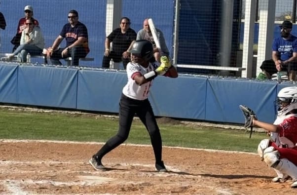Madison Dove hitting during a game at the AB FASA Super Bowl Saturday event.