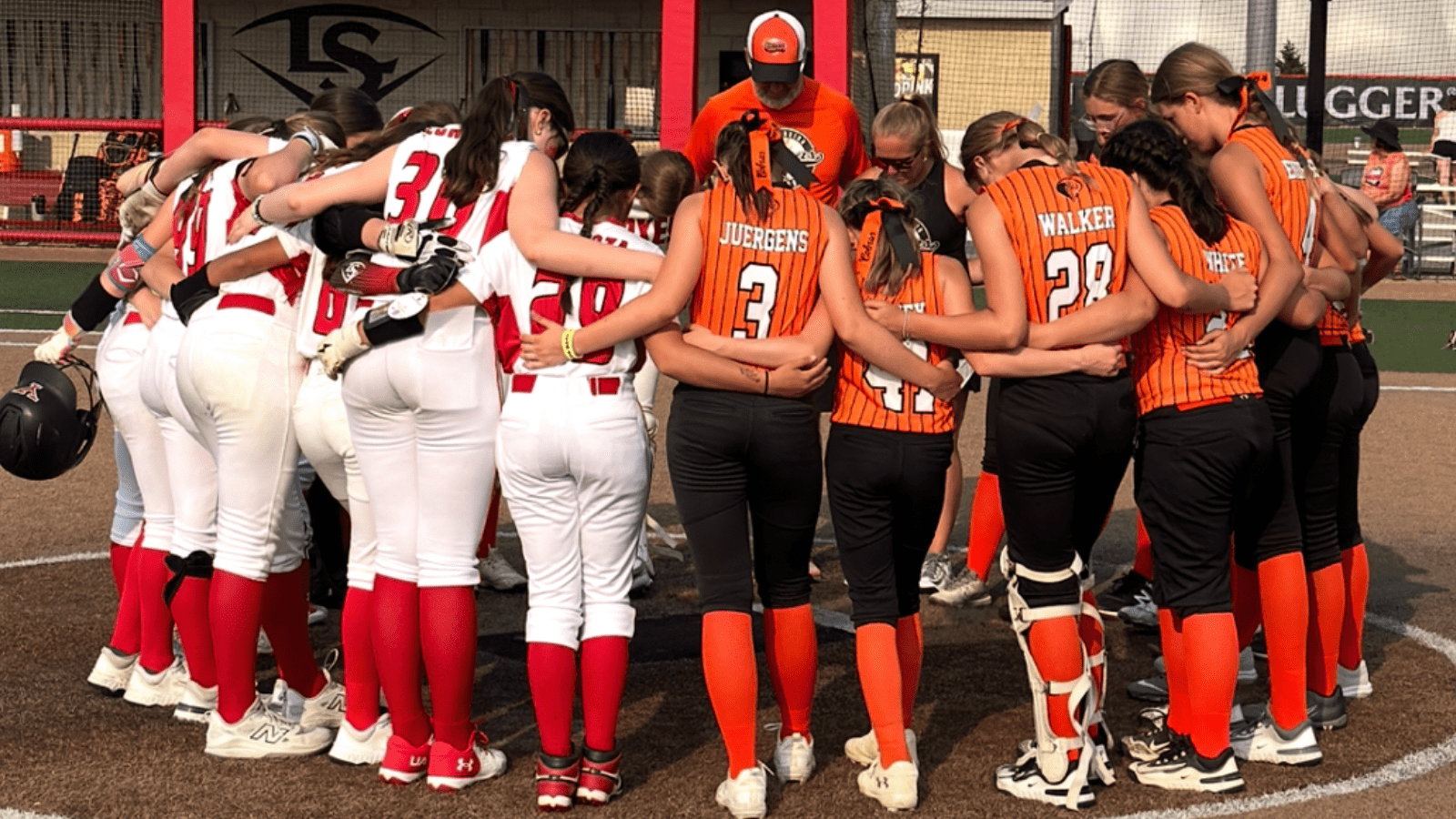 Yorkville Foxes 2012 - Buonamici and an opposing team bow their heads in a postgame prayer circle, forming a powerful moment of unity.