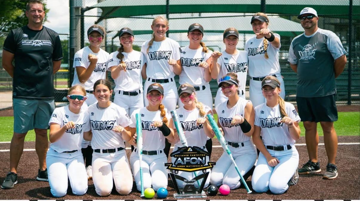 Outlaws Fastpitch National 2028 celebrates after winning the Alliance Fastpitch Open Nationals with a perfect 9–0 record in Chattanooga, Tenn.